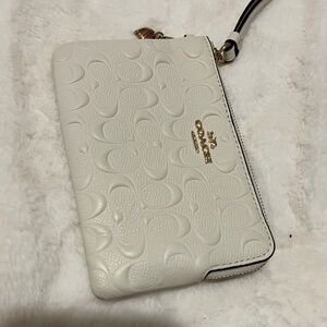 Coach Cream Embossed Wristlet with Gold Logo